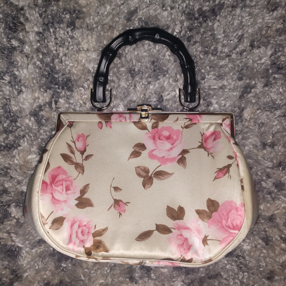 Woman's vintage floral silk like clutch purse.